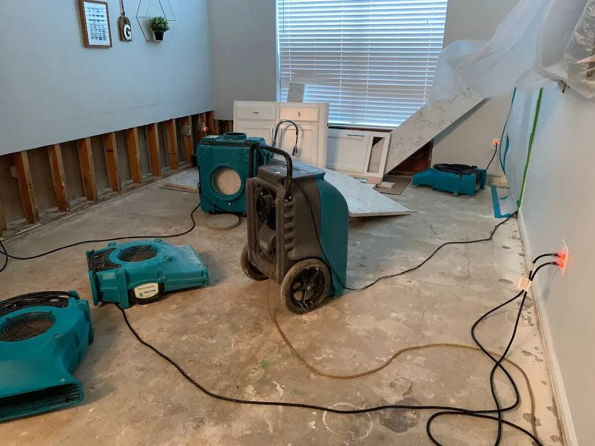 Dehumidifier in flood-cut room for Water Damage Restoration in Woodmoor